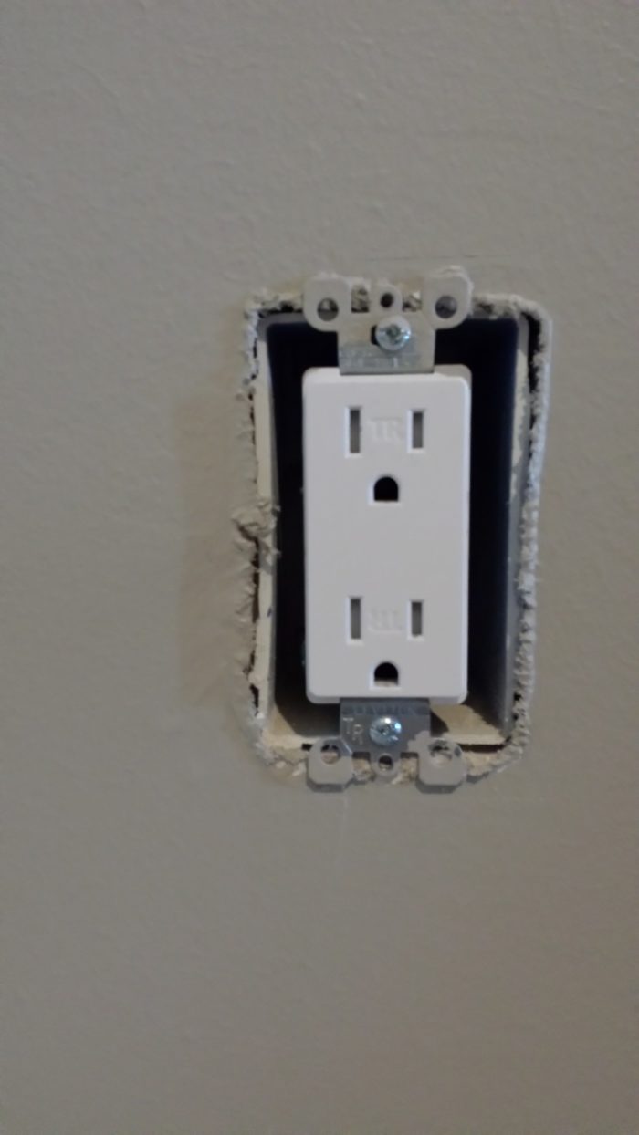 Does code require fireproof caulk around electrical boxes & light